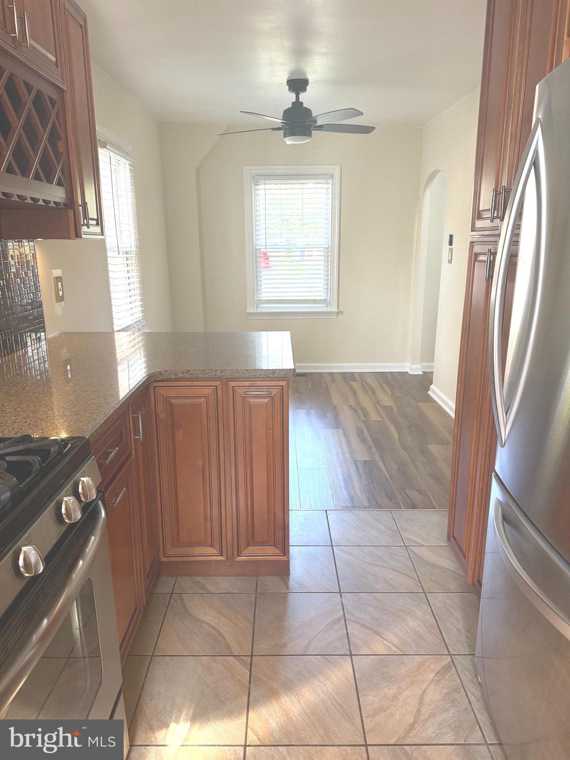 229 Edge Hill Road Glenside, PA 19038 - Photo 4 of 25 a view of a kitchen with a sink and a window