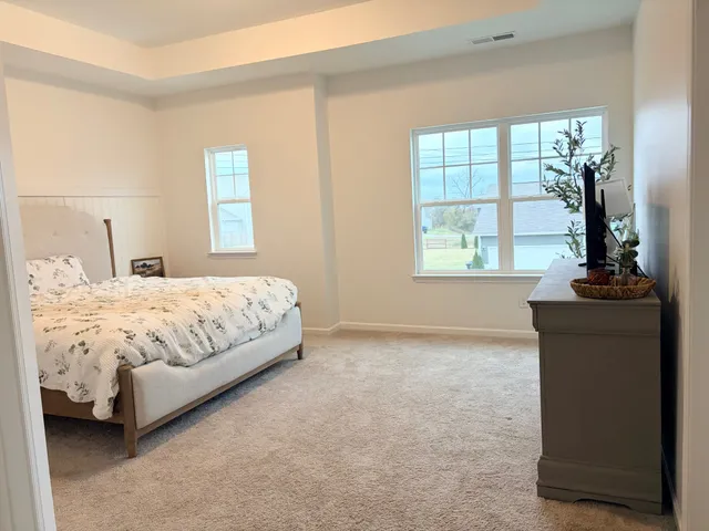 a bathroom with a toilet a sink and a shower