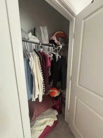 a view of a workspace with furniture