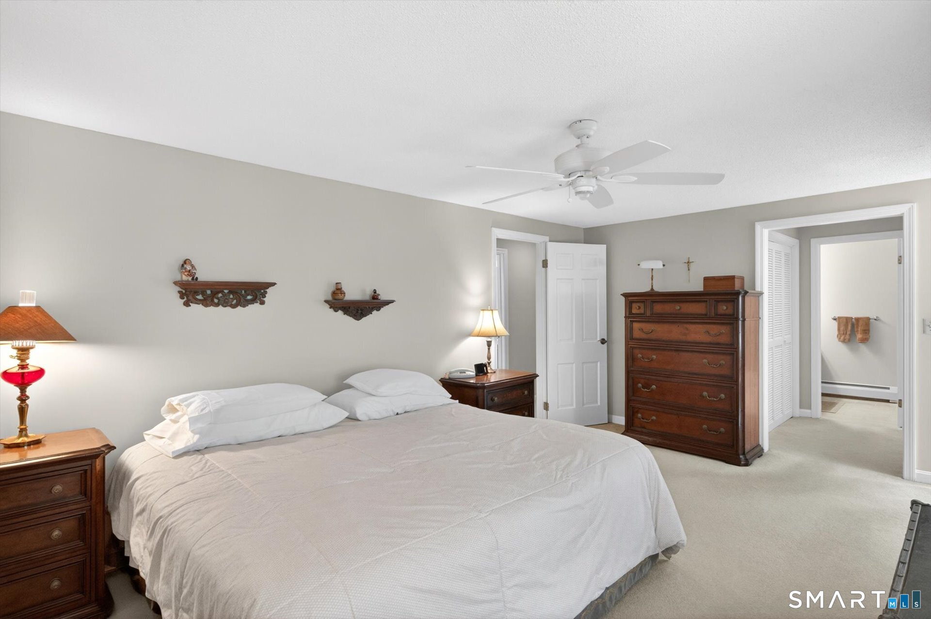 5 Shingle Mill Drive Canton, CT 06019 - Photo 27 of 38 a bedroom with a bed and a ceiling fan