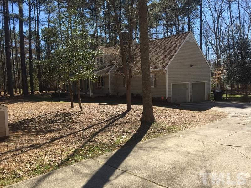 12005 Shooting Club Road Raleigh, NC 27613 - Photo 2 of 25 a view of a backyard of snow