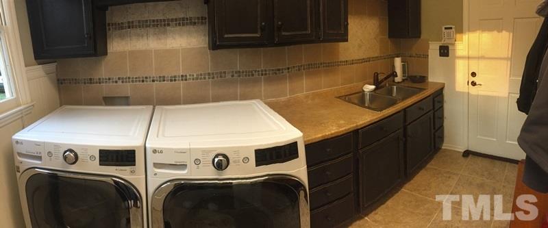 12005 Shooting Club Road Raleigh, NC 27613 - Photo 11 of 25 a utility room with dryer and washer