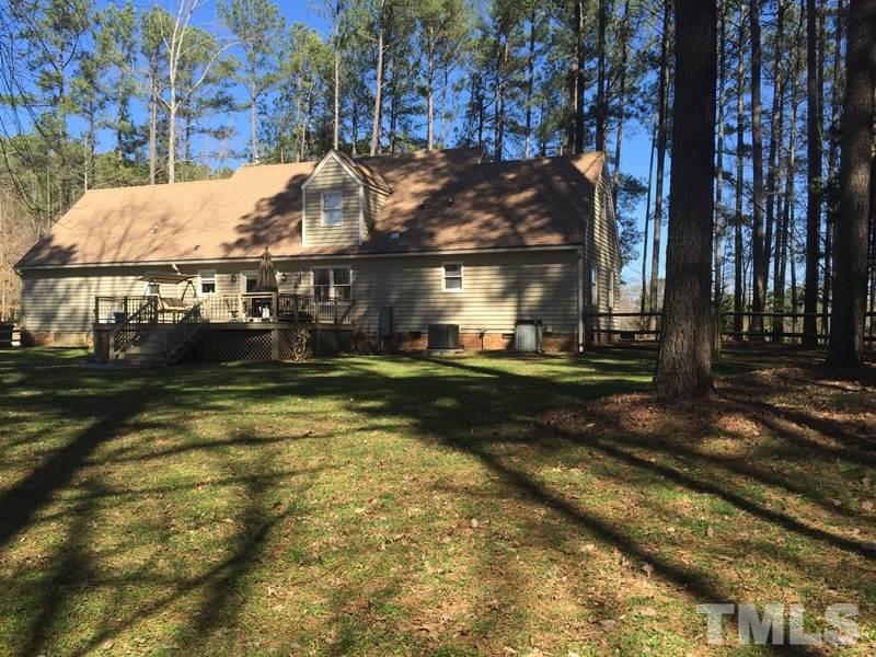 12005 Shooting Club Road Raleigh, NC 27613 - Photo 5 of 25 a view of house with yard