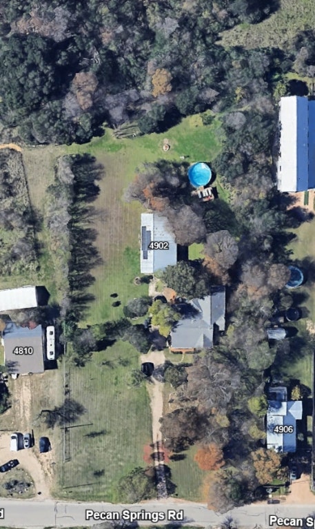4902 Pecan Springs Road Austin, TX 78723 - Photo 1 of 17 a aerial view of a house with a yard