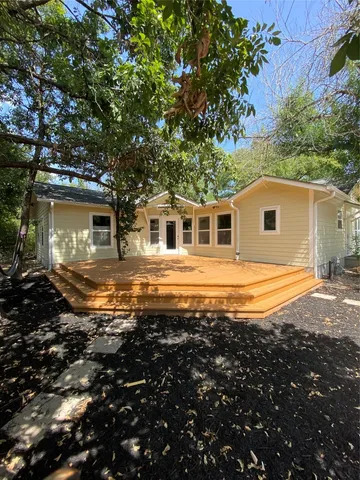 a view of house with garden space