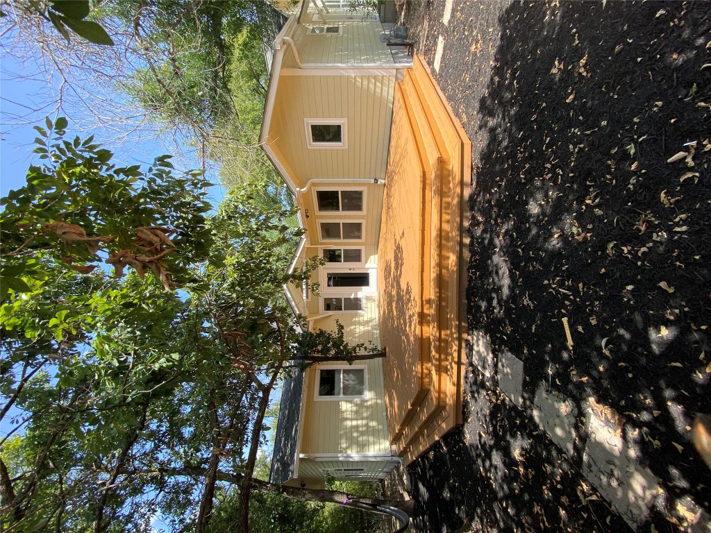 4902 Pecan Springs Road Austin, TX 78723 - Photo 11 of 17 a view of house with garden space