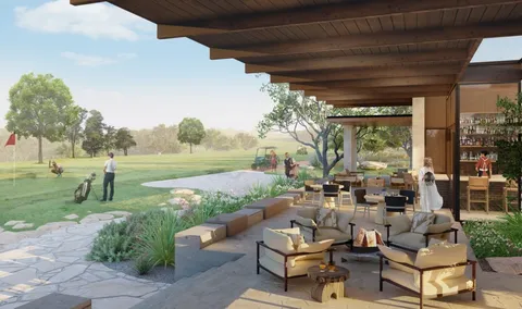 a patio with yard table and chairs