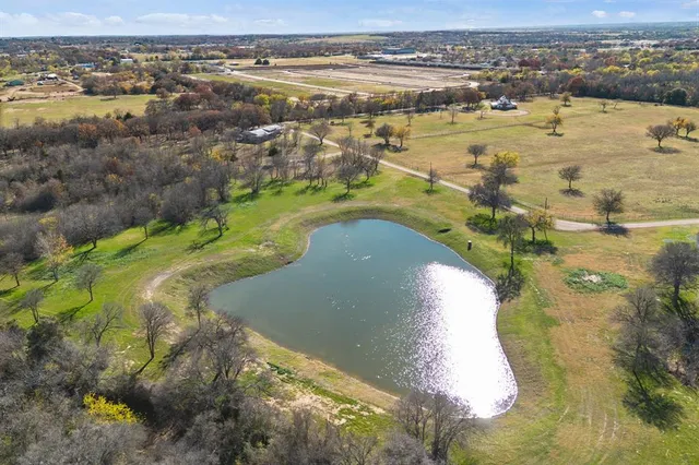 an aerial view of lake residential house with outdoor space