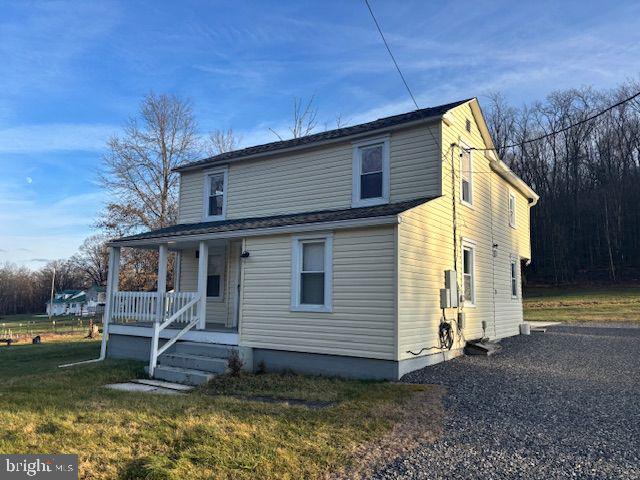 16806 Dutch Hollow Road Northwest Mount Savage, MD 21545 - Photo 1 of 17 a view of a house with a yard