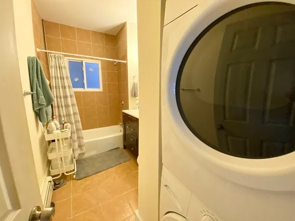 a view of a bathroom with mirror