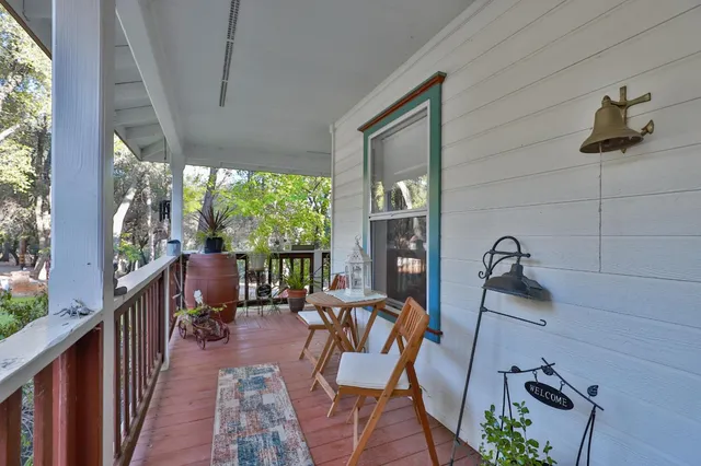 a reading room with furniture and a window