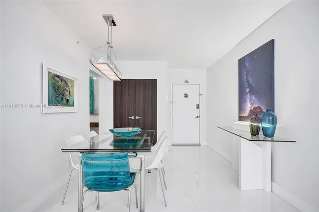 a kitchen with stainless steel appliances granite countertop a sink and a stove