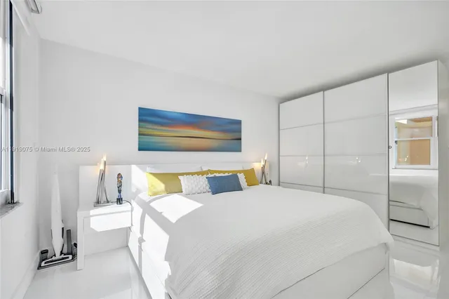 a view of ocean with a multi story building