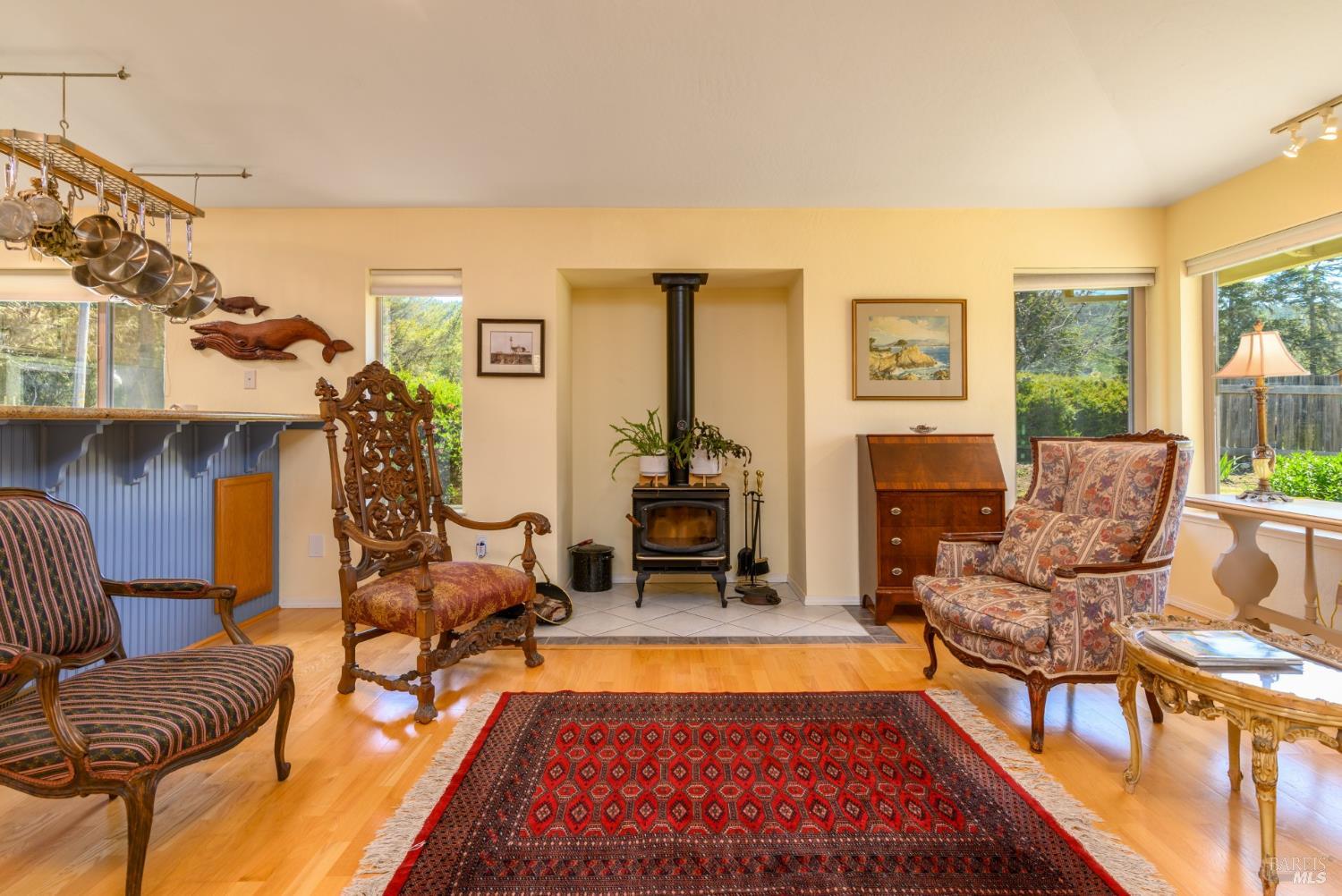 15721 Forest View Road Manchester, CA 95459 - Photo 15 of 50 The comfortable living area is light and bright , with open living/dining/ktichen areas, multiple view windows and Golden Oak flooring throughout...