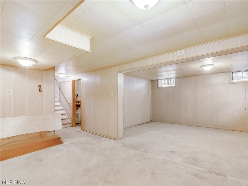 1047 Roland Road Lyndhurst, OH 44124 - Photo 21 of 26 Full Basement provides a lot of storage and features finished walls and ceiling.