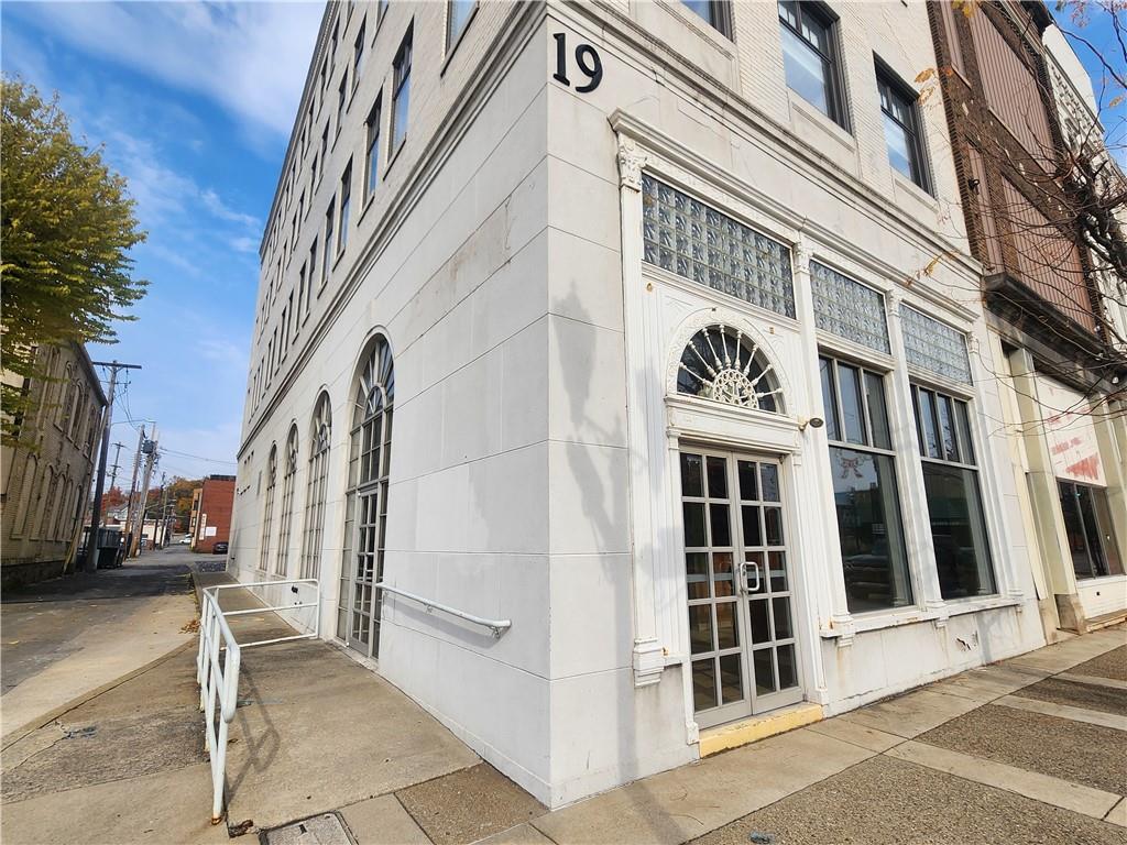 a view of a building from a ceiling tree