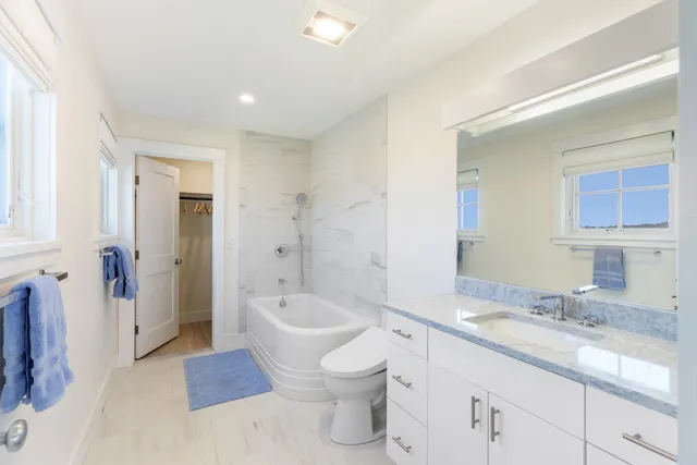 a bedroom with a bed and closet