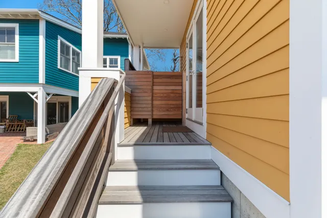 a terrace of a house with outdoor seating