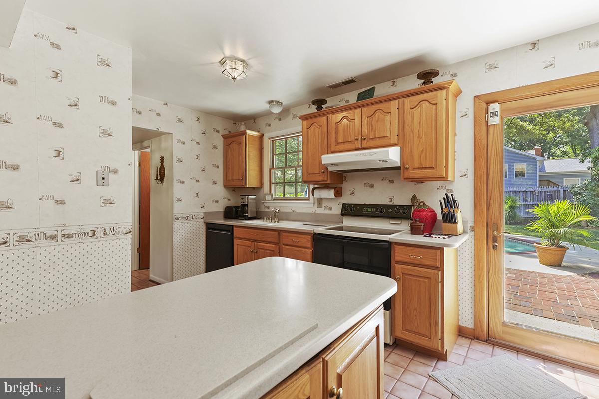1314 Cape St Claire Road Annapolis, MD 21409 - Photo 13 of 60 Kitchen with walk-out to back yard