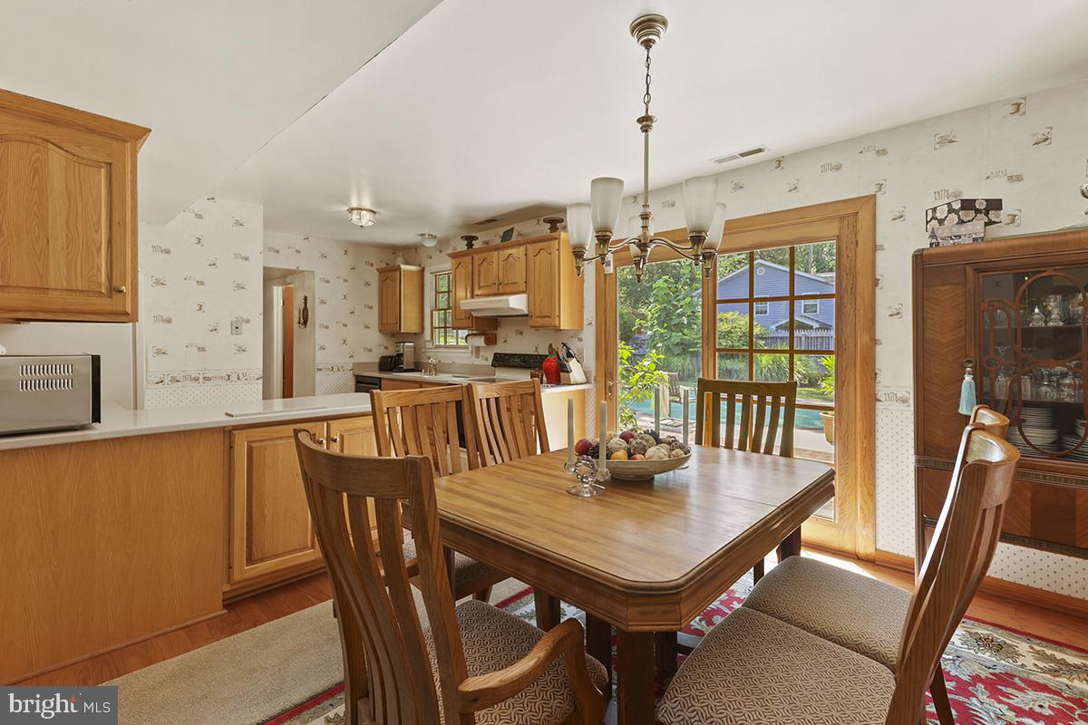 1314 Cape St Claire Road Annapolis, MD 21409 - Photo 17 of 60 Dining area overlooking back yard