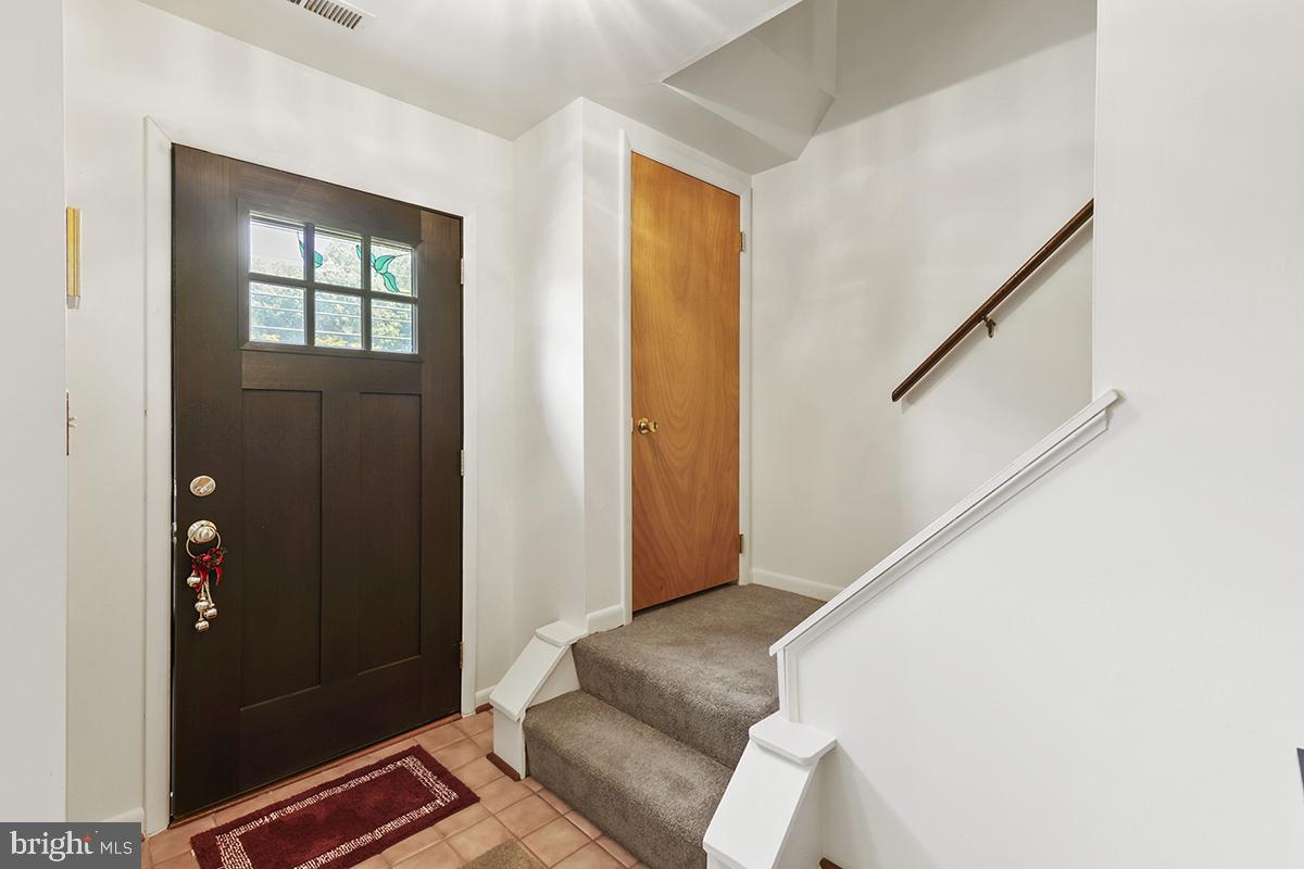 1314 Cape St Claire Road Annapolis, MD 21409 - Photo 28 of 60 Entrance of home leading to the upper level