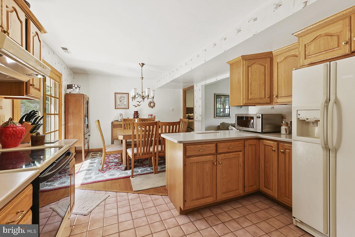 1314 Cape St Claire Road Annapolis, MD 21409 - Photo 10 of 60 Kitchen with view of Dining Room