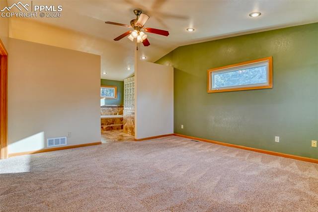 16111 Roller Coaster Road Colorado Springs, CO 80921 - Photo 10 of 26 Large Master bedroom with vies of Pikes Peak
