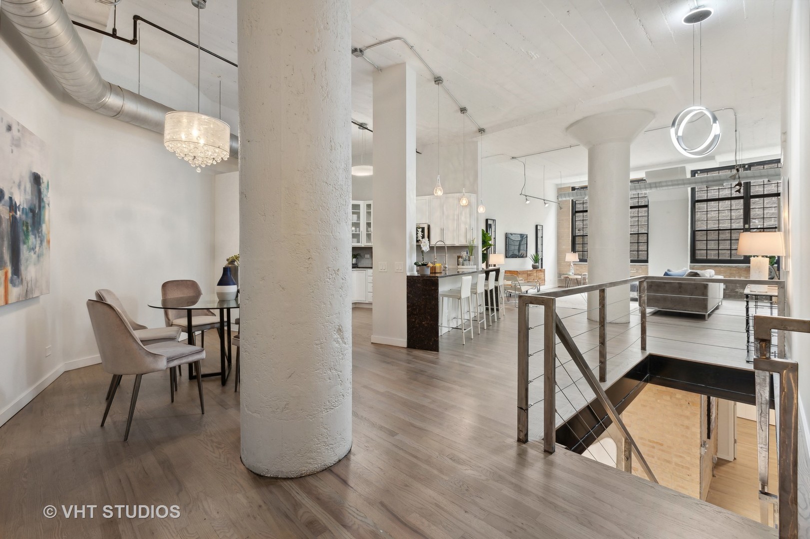 17 North Loomis Street, Unit 1J Chicago, IL 60607 - Photo 2 of 30 a view of a dining room with furniture and a table