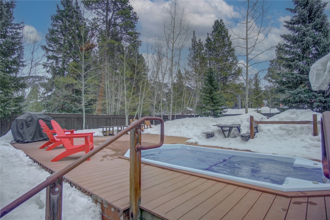 78 Guller Road, Unit 104 Copper Mountain, CO 80443 - Photo 12 of 15 a view of deck with chairs and wooden fence