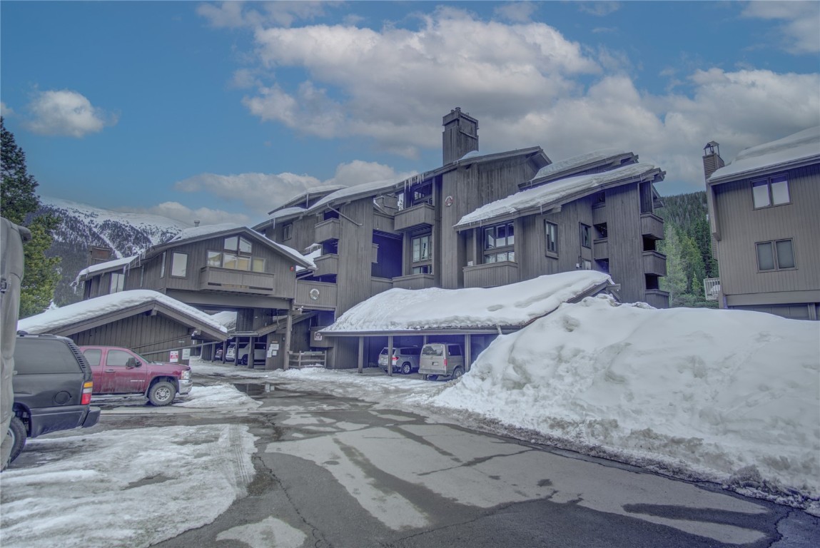 78 Guller Road, Unit 104 Copper Mountain, CO 80443 - Photo 15 of 15 a front view of a house with a yard