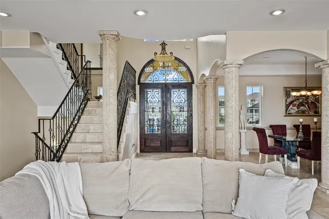 a bathroom with a shower sink and mirror