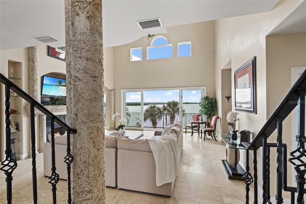 3236 Gulf Winds Circle Hernando Beach, FL 34607 - Photo 18 of 96 a living room with furniture and a large window