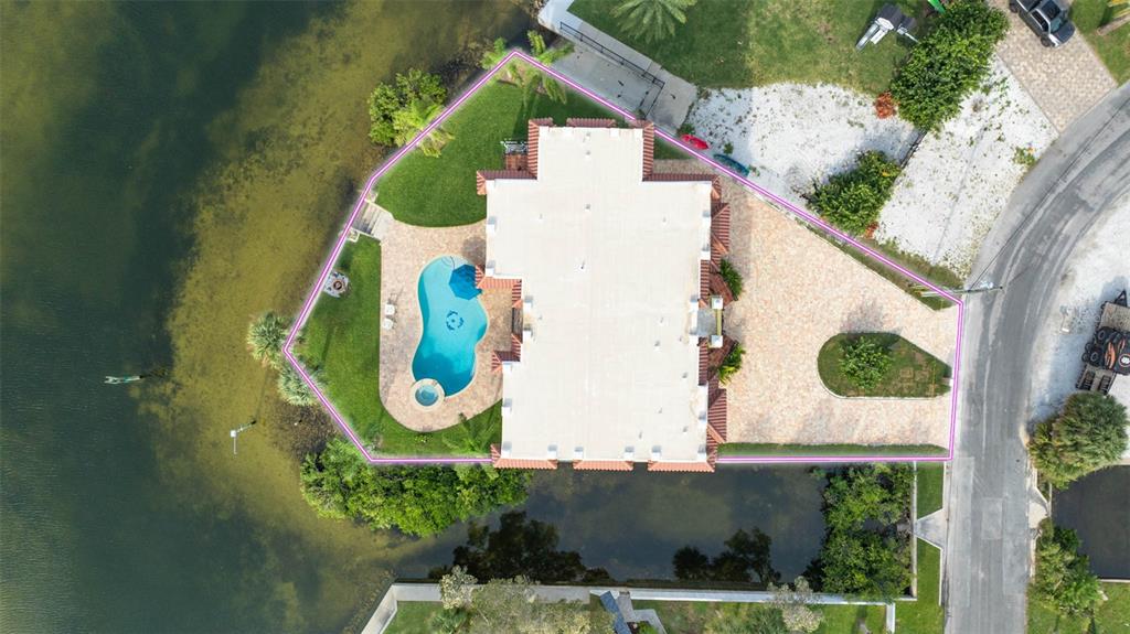 3236 Gulf Winds Circle Hernando Beach, FL 34607 - Photo 2 of 96 an aerial view of a house with a swimming pool