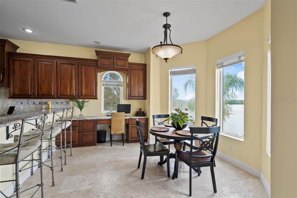 3236 Gulf Winds Circle Hernando Beach, FL 34607 - Photo 27 of 96 a view of a dining room with furniture window and wooden floor