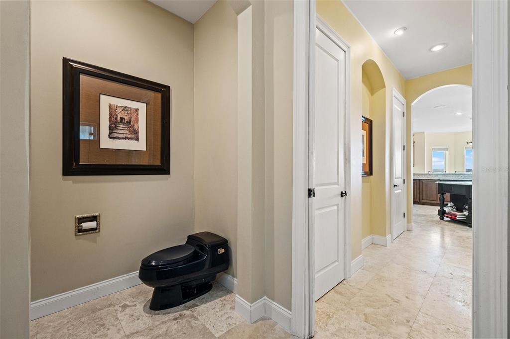 3236 Gulf Winds Circle Hernando Beach, FL 34607 - Photo 30 of 96 a view of a hallway to a livingroom and a window