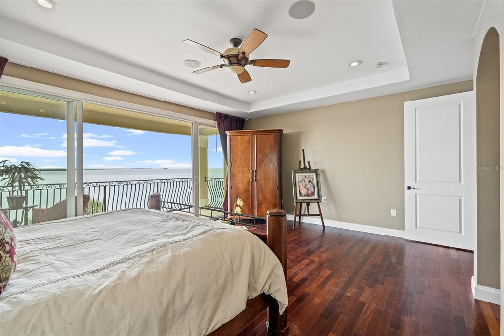 3236 Gulf Winds Circle Hernando Beach, FL 34607 - Photo 52 of 96 a bedroom with a bed and a large window