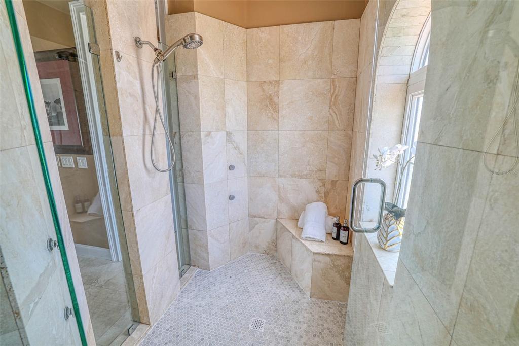 3236 Gulf Winds Circle Hernando Beach, FL 34607 - Photo 60 of 96 a bathroom with a tub and a shower