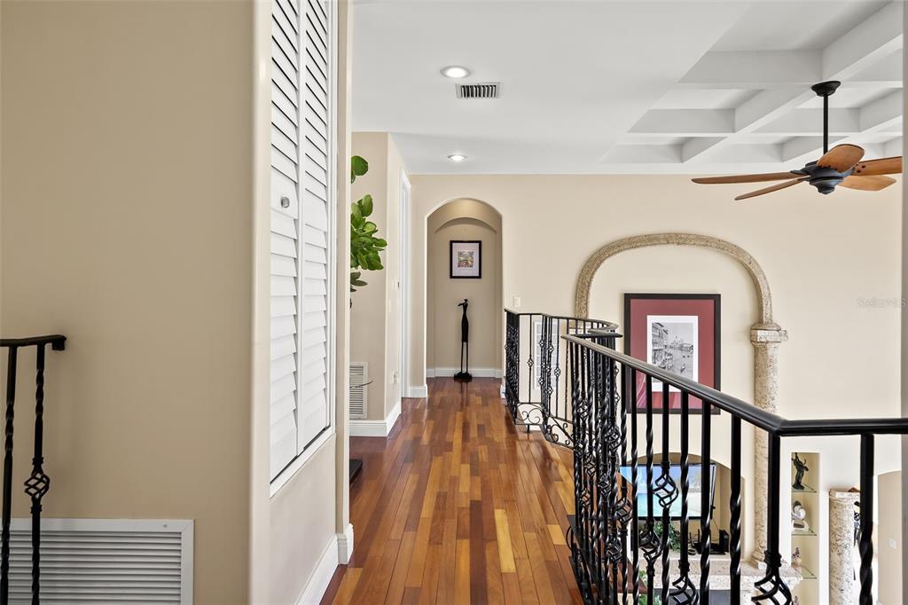 3236 Gulf Winds Circle Hernando Beach, FL 34607 - Photo 66 of 96 a view of a hallway with wooden floor and windows