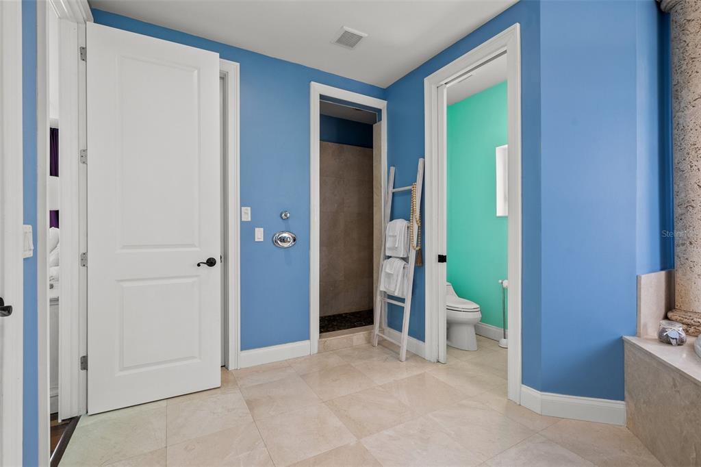 3236 Gulf Winds Circle Hernando Beach, FL 34607 - Photo 70 of 96 an empty room with closet and a bathroom