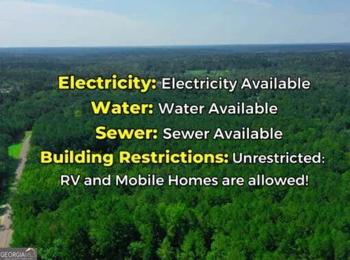 a view of a big yard with lots of green space and deers