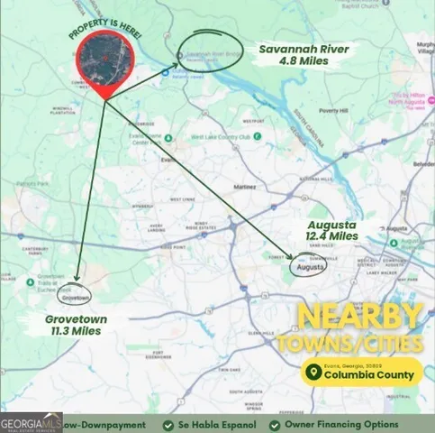 a view of a street with a tree