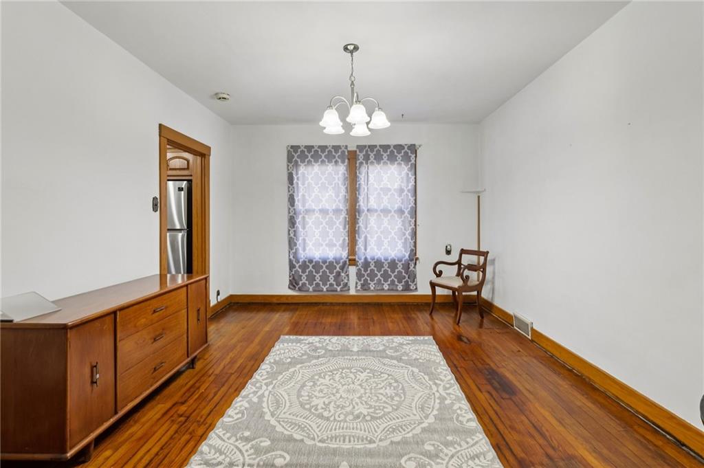 1910 Ridge Avenue New Kensington, PA 15068 - Photo 12 of 50 a view of a room with window and chandelier