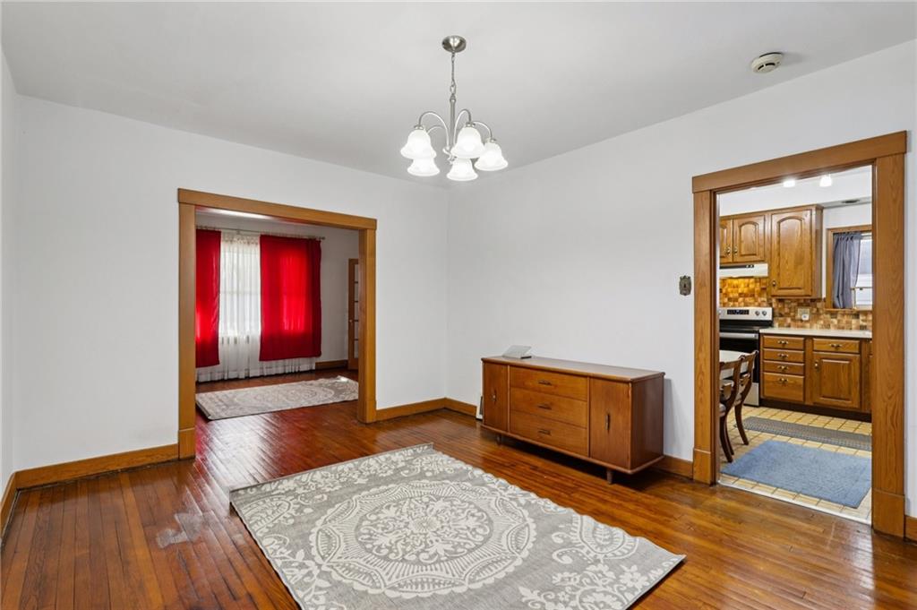 1910 Ridge Avenue New Kensington, PA 15068 - Photo 14 of 50 a view of a hallway with wooden floor and kitchen