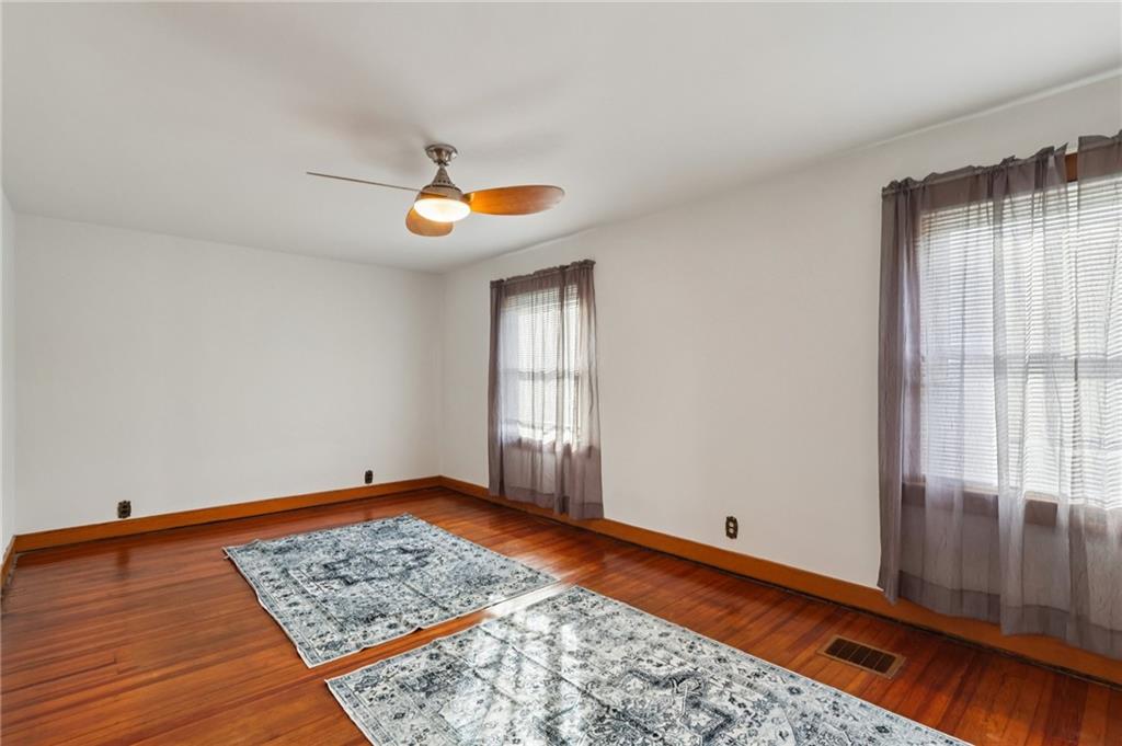1910 Ridge Avenue New Kensington, PA 15068 - Photo 20 of 50 wooden floor in an empty room with a window