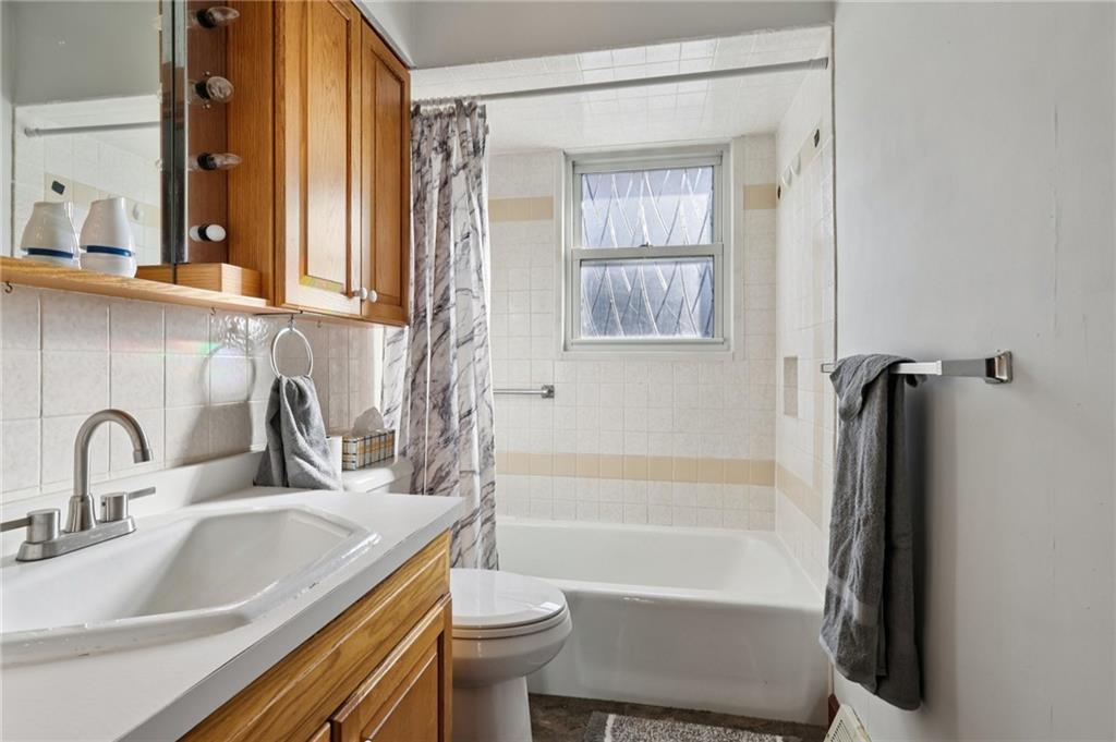 1910 Ridge Avenue New Kensington, PA 15068 - Photo 24 of 50 a bathroom with a sink and a bathtub