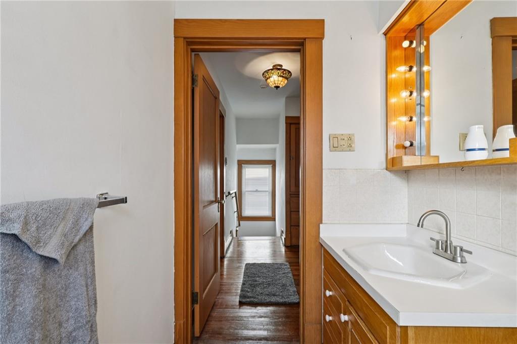 1910 Ridge Avenue New Kensington, PA 15068 - Photo 27 of 50 a en suite bathroom with a sink and mirror