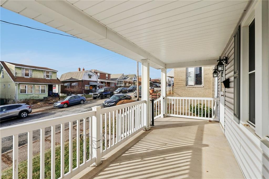 1910 Ridge Avenue New Kensington, PA 15068 - Photo 5 of 50 a view of a porch with wooden fence