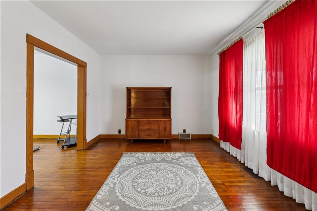 1910 Ridge Avenue New Kensington, PA 15068 - Photo 8 of 50 a view of a room with wooden floor and stairs
