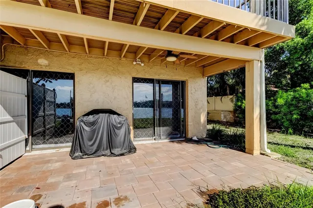 a view of a ocean with palm trees