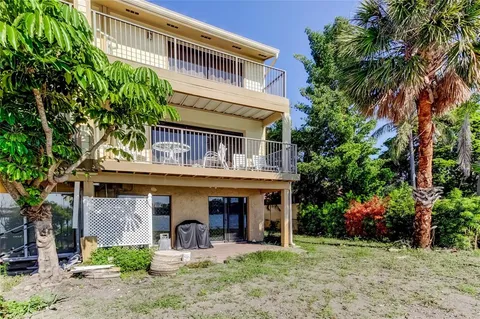 a view of swimming pool with a yard
